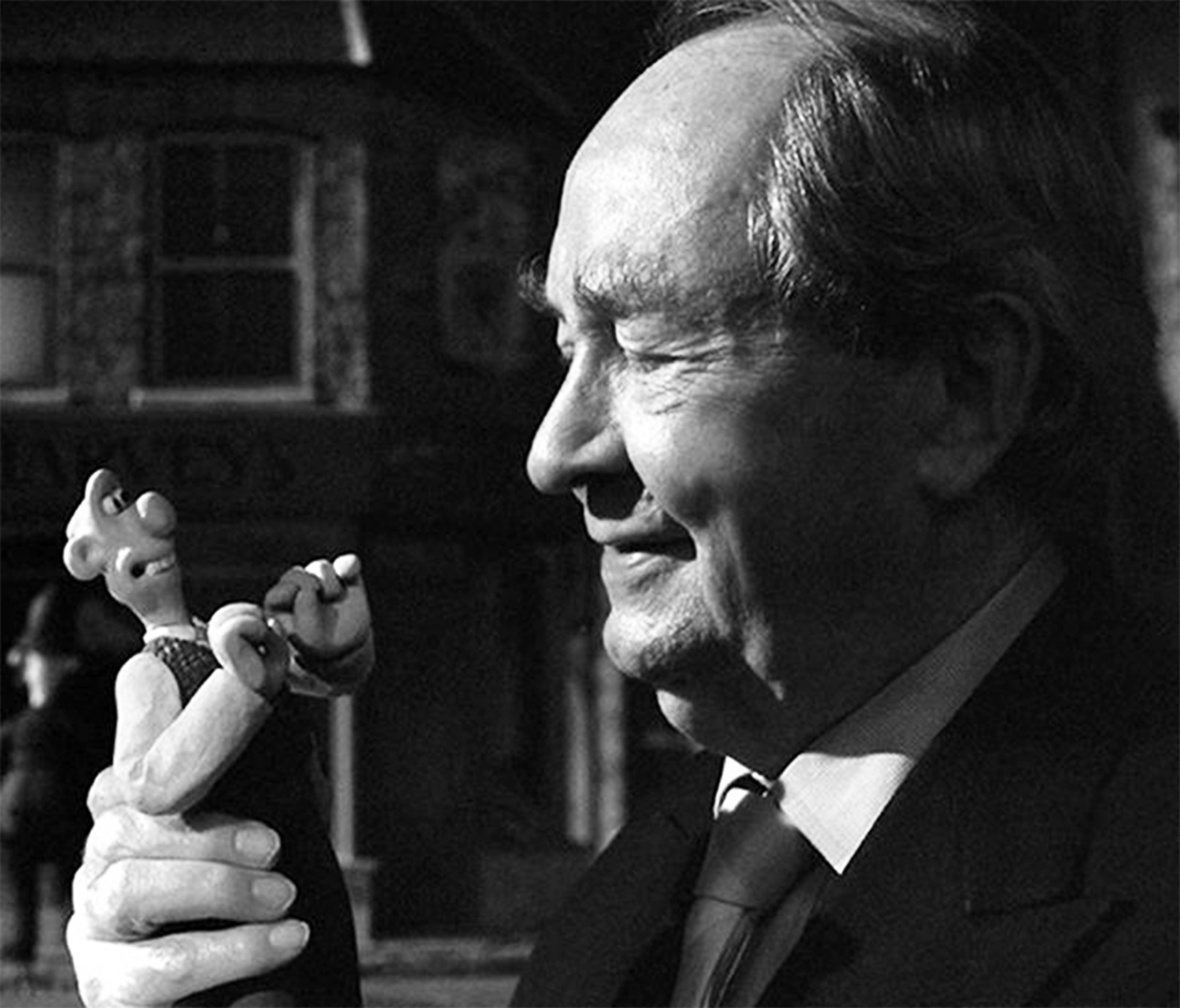 Peter Sallis is seen in this 2004 photo holding his counterpart Wallace while visiting Aardman Animations studio during the filming of the Academy Award Winning stop motion animated classic feature film Wallace & Gromit: The Curse of the Were-Rabbit (2005).